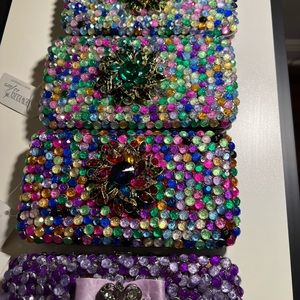 Bling wallets  pick 1 or 2 they are $65 per option; no 2 wallets are identical